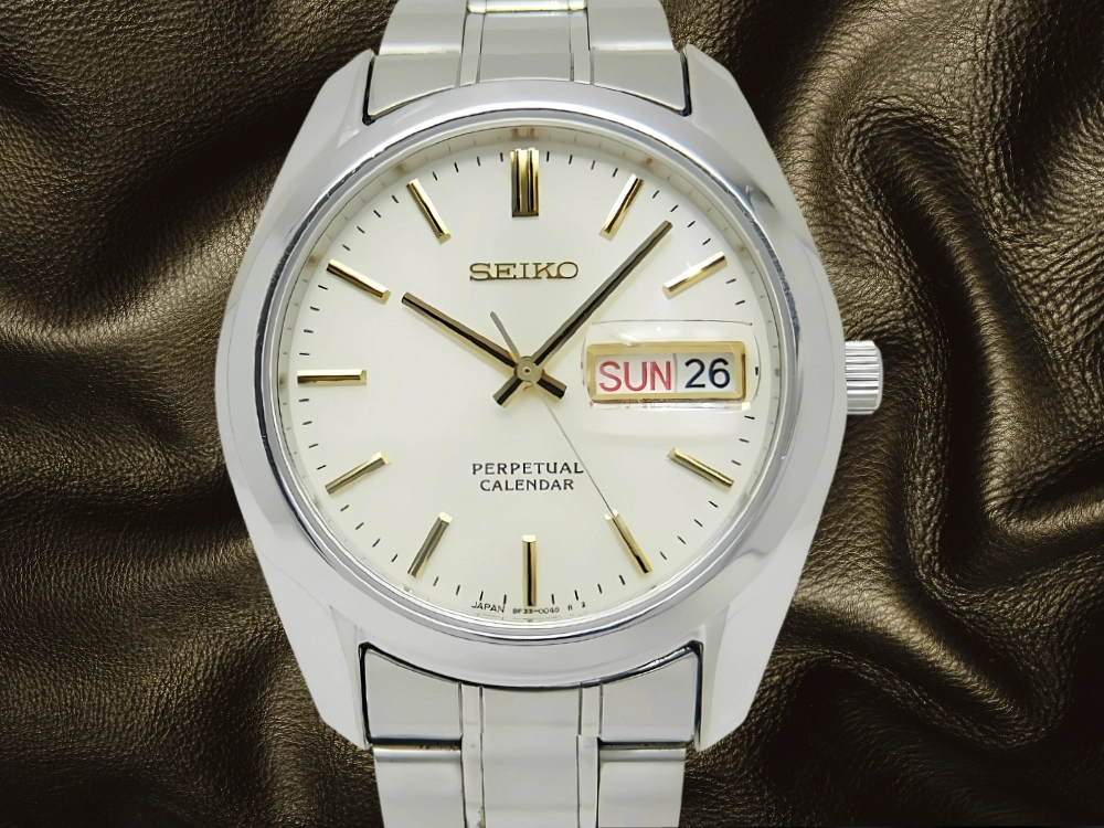 SEIKO SBQL003 Perpetual Calendar Quartz 8F33-0040 Ivory Dial SS